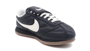 NIKE CORTEZ SE  BLACK/SAIL/GUM DARK BROWN/METALLIC DARK GREY 5